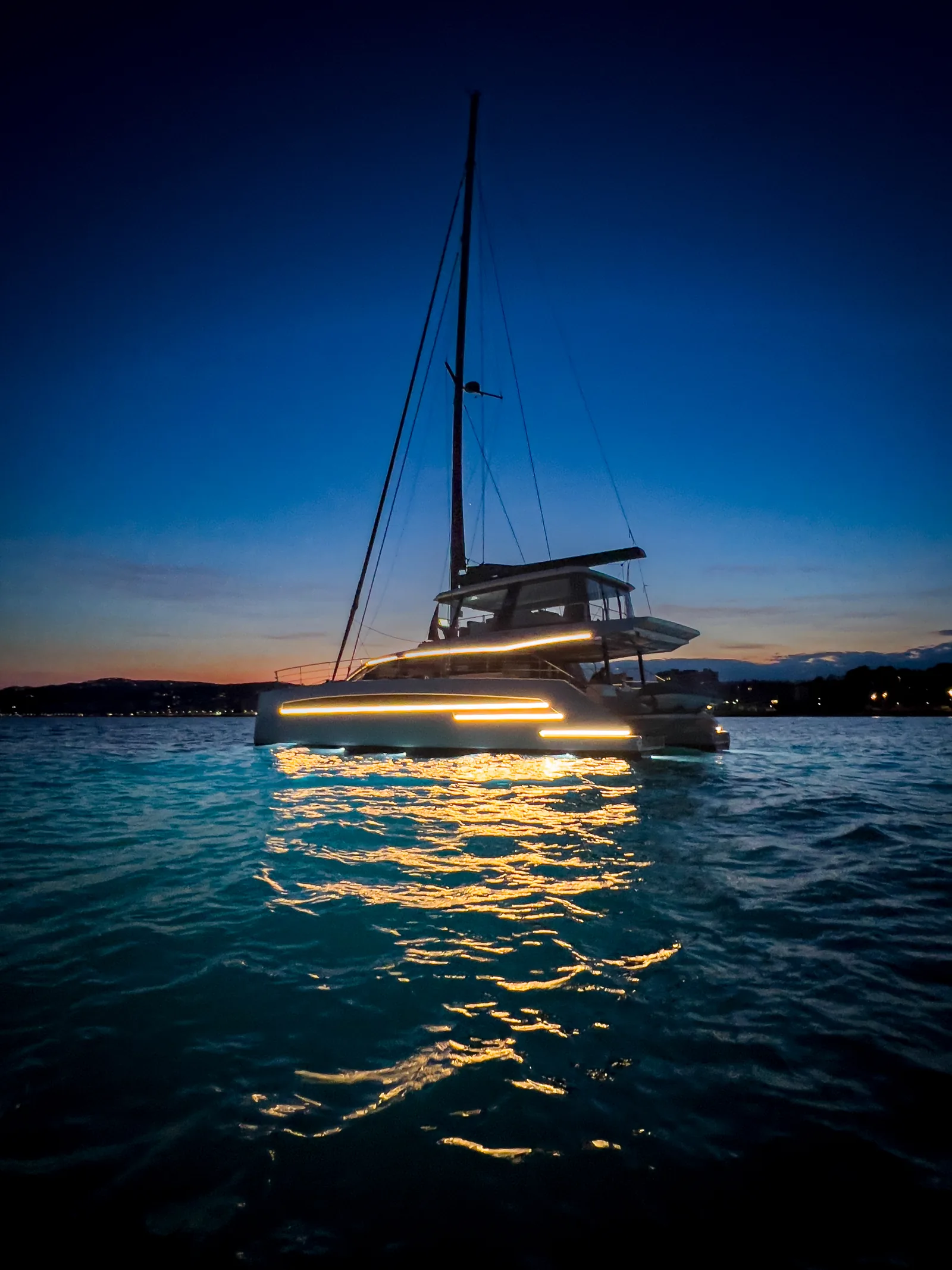 Simbad 55 at anchor, blue hour