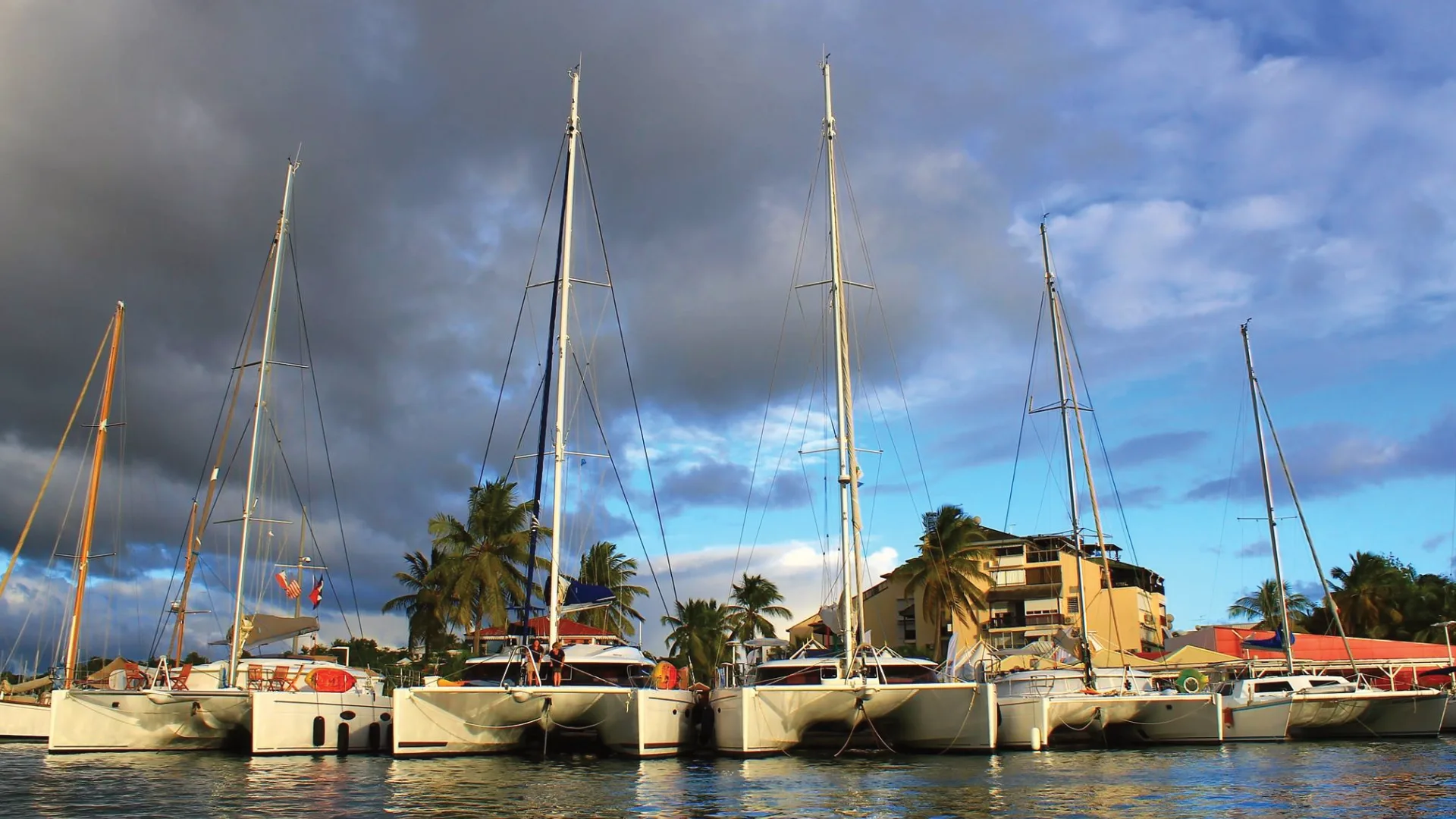 Catamarans moored in a Caribbean marina