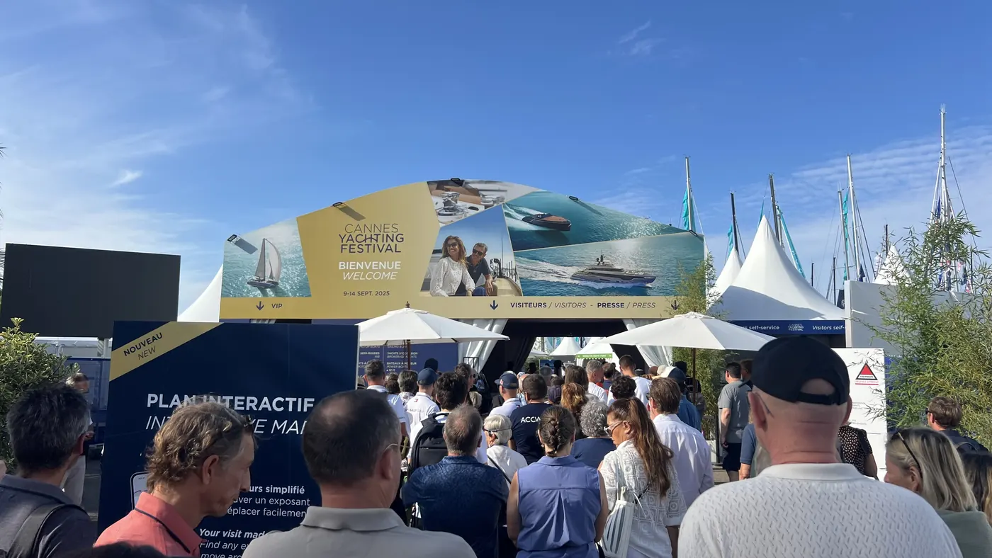 Visitors at the Cannes Yachting Festival welcome arch