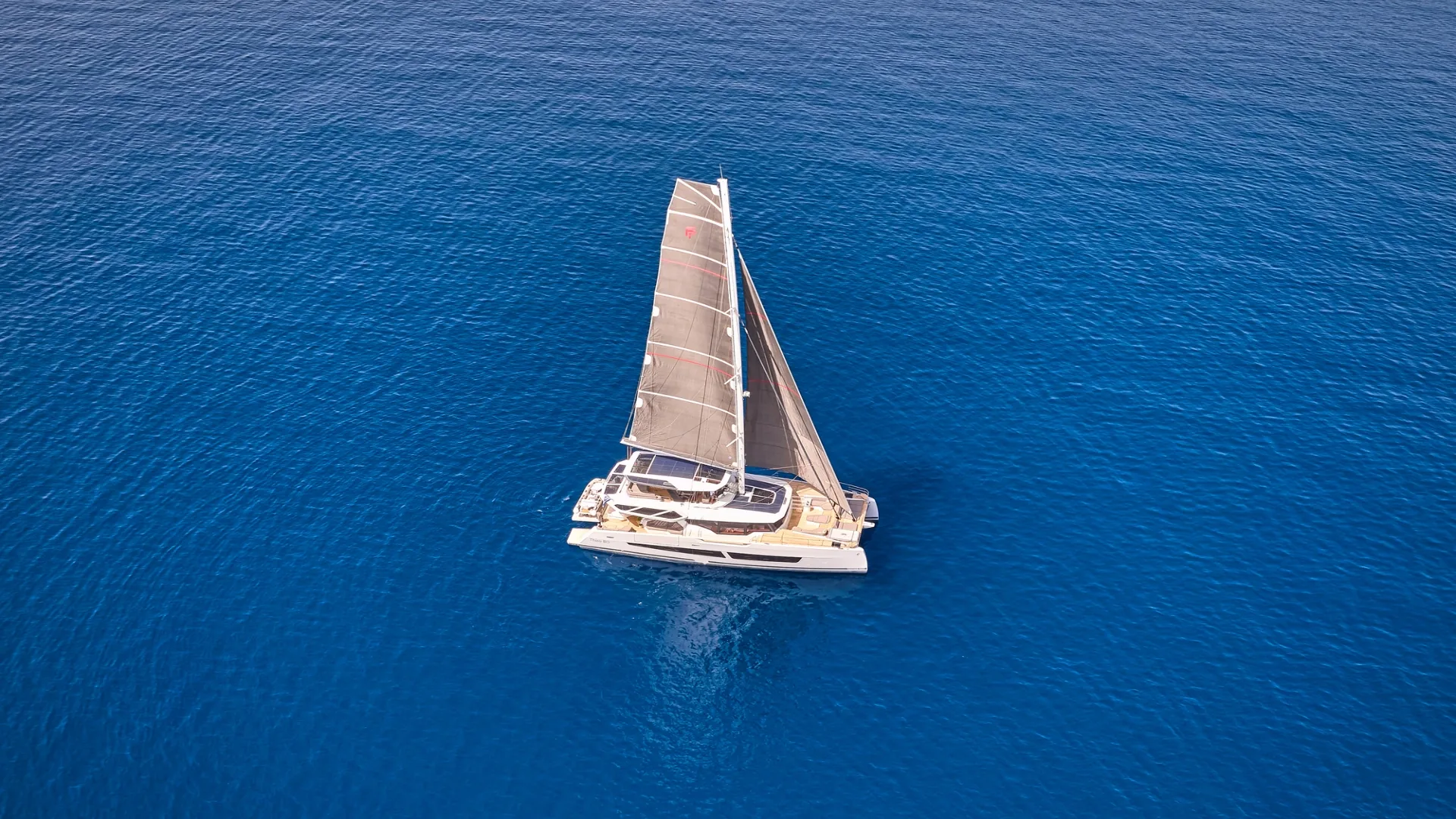 Fountaine Pajot Thira 80 — Aloia — 2023 Fountaine Pajot Thira for sale 80 under sail from above